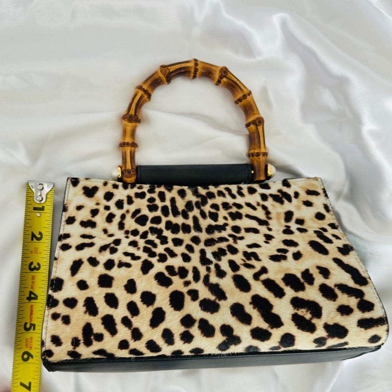 Authentic Gucci Nymphaea Leopard Calf Hair
Bag w/Bamboo Pearl Handles - Clairely Amazing