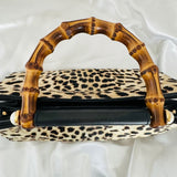 Authentic Gucci Nymphaea Leopard Calf Hair
Bag w/Bamboo Pearl Handles - Clairely Amazing