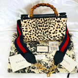 Authentic Gucci Nymphaea Leopard Calf Hair
Bag w/Bamboo Pearl Handles - Clairely Amazing