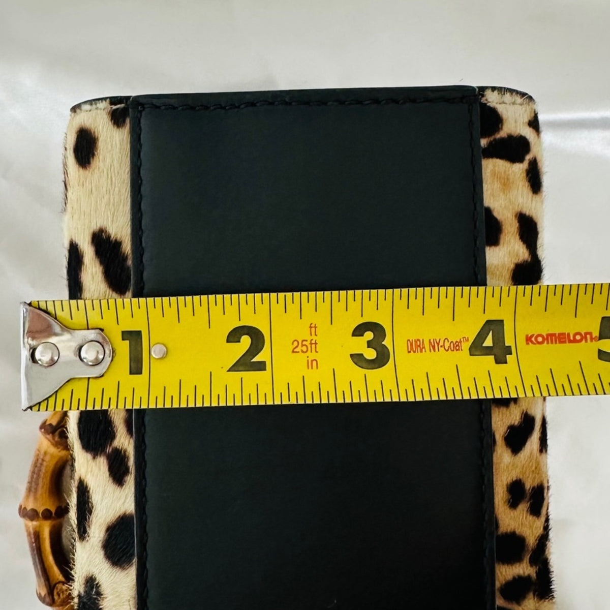 Authentic Gucci Nymphaea Leopard Calf Hair
Bag w/Bamboo Pearl Handles - Clairely Amazing