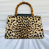 Authentic Gucci Nymphaea Leopard Calf Hair
Bag w/Bamboo Pearl Handles - Clairely Amazing