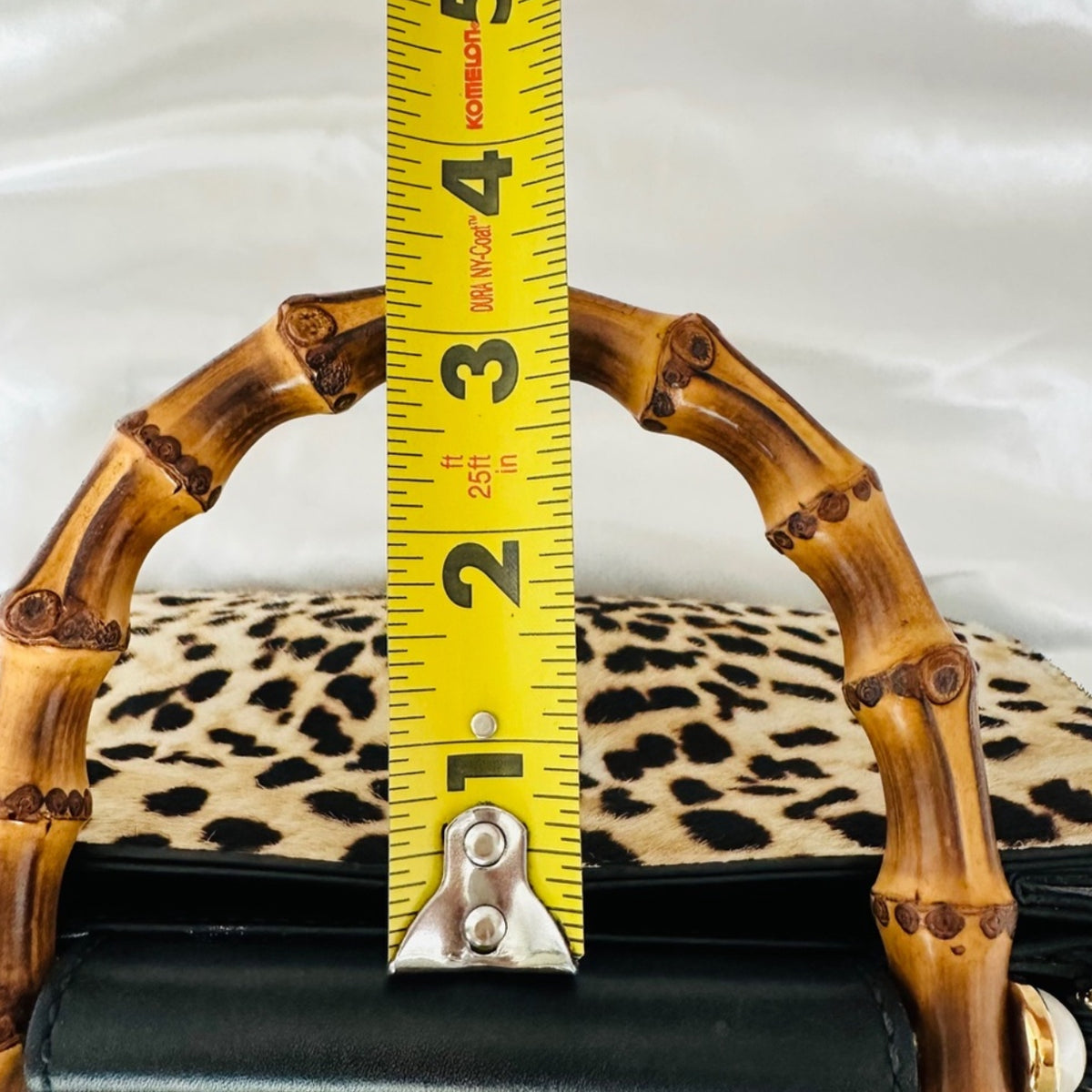 Authentic Gucci Nymphaea Leopard Calf Hair
Bag w/Bamboo Pearl Handles - Clairely Amazing