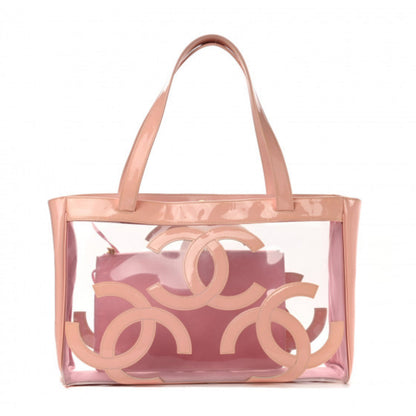 CHANEL 
Vinyl Patent CC Logo Beach Tote Pink - Clairely Amazing