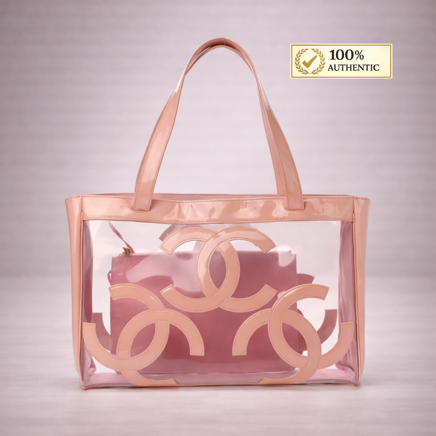CHANEL 
Vinyl Patent CC Logo Beach Tote Pink