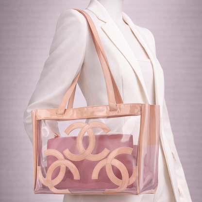 CHANEL 
Vinyl Patent CC Logo Beach Tote Pink