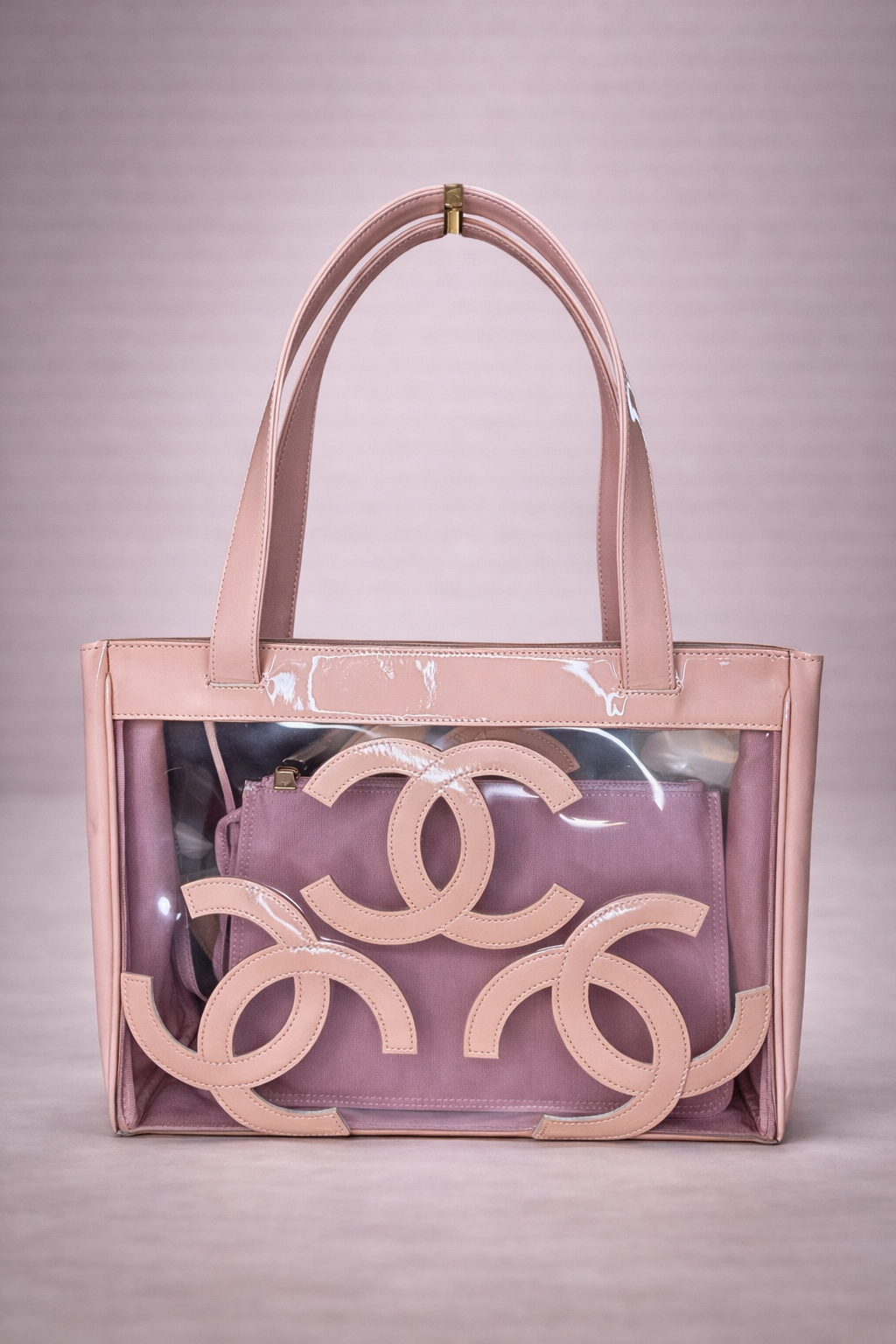 CHANEL 
Vinyl Patent CC Logo Beach Tote Pink