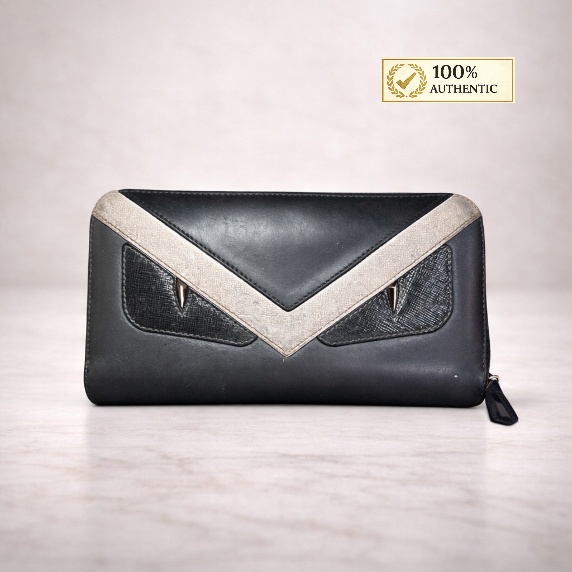 Authentic Pre-Owned Fendi Monster Zip Around Wallet – Black & Ivory