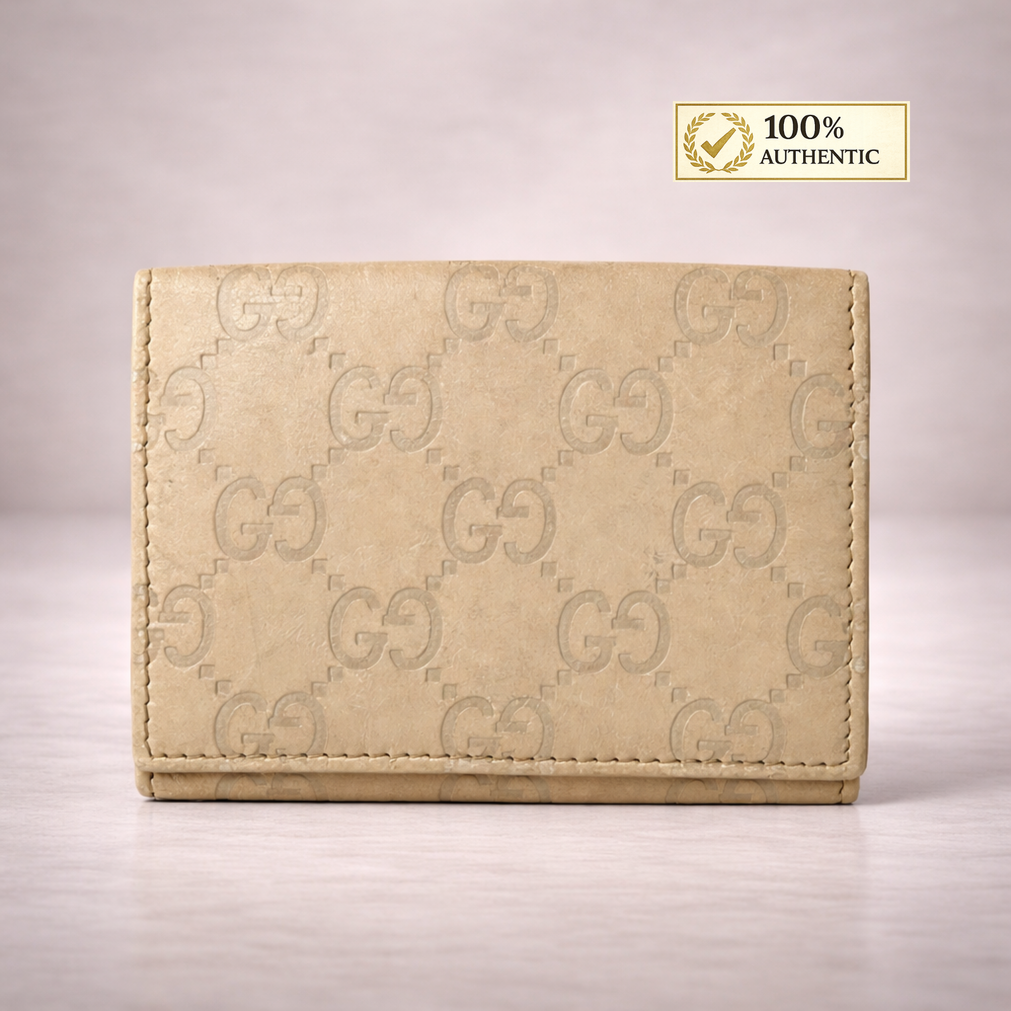 Authentic Pre-Owned Gucci GG Embossed Leather Compact Wallet – Beige