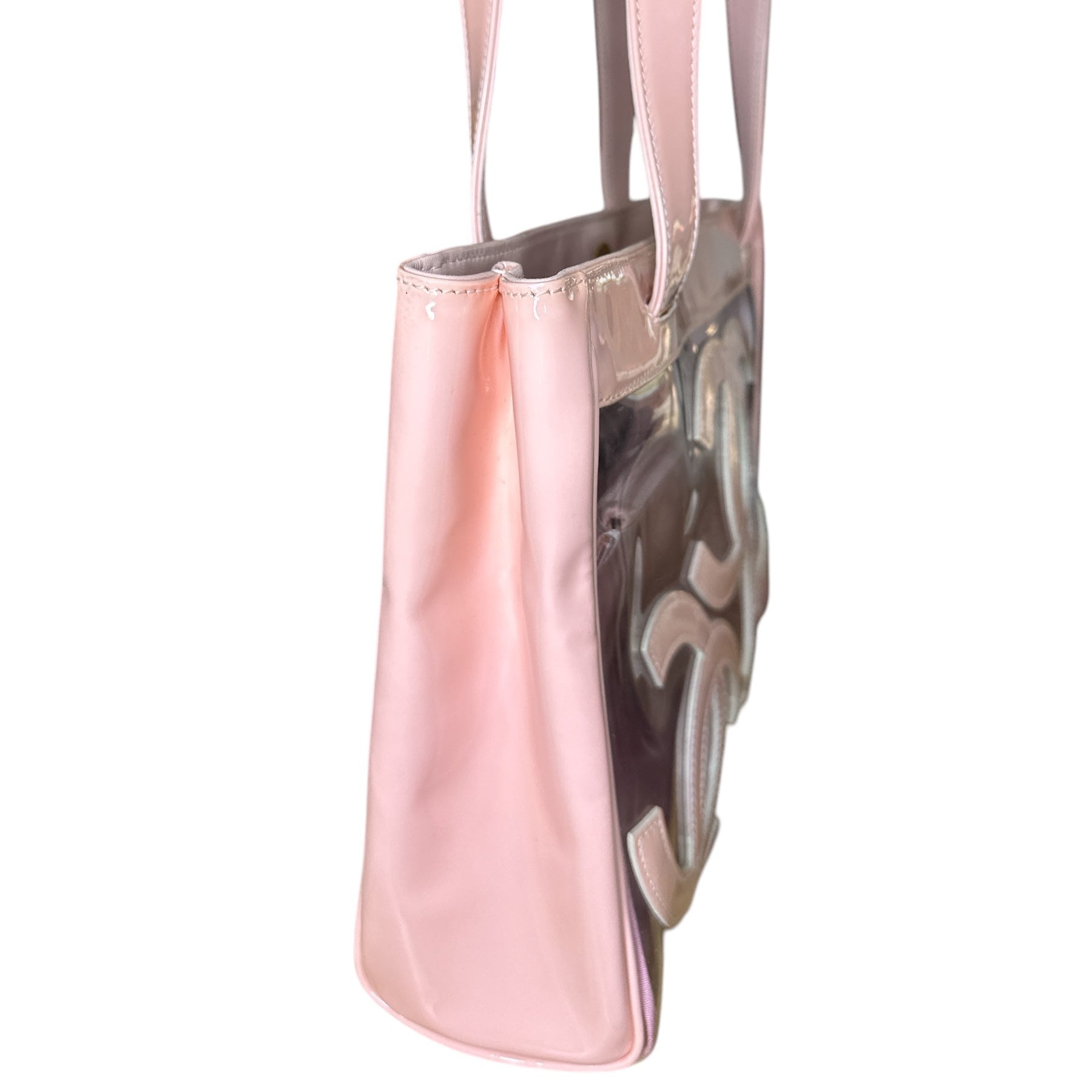 CHANEL 
Vinyl Patent CC Logo Beach Tote Pink - Clairely Amazing