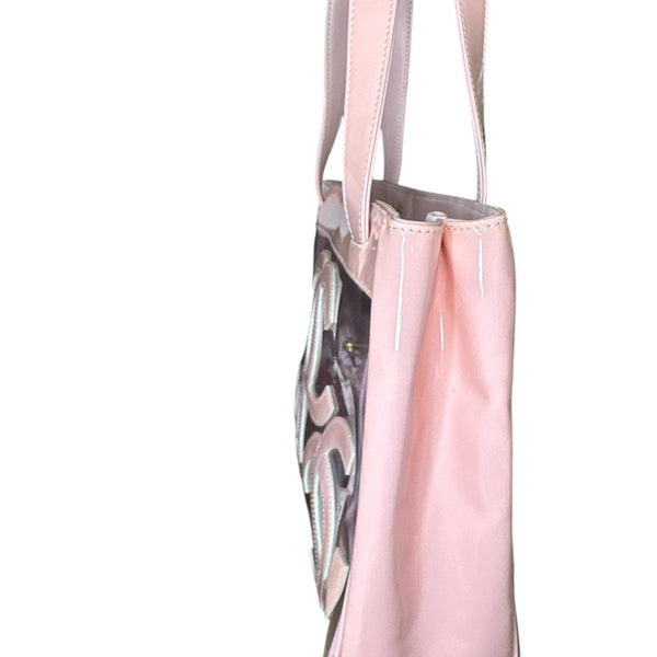 CHANEL 
Vinyl Patent CC Logo Beach Tote Pink - Clairely Amazing