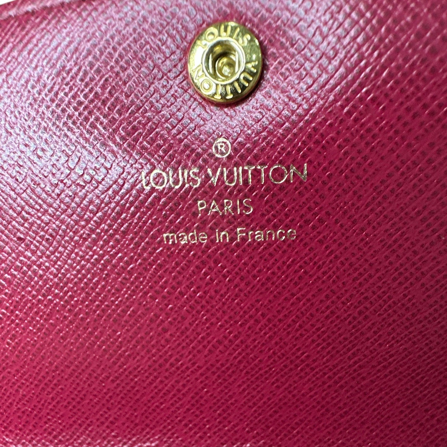 LOUIS VUITTON 
Monogram Emilie Wallet Fuchsia - Clairely Amazing