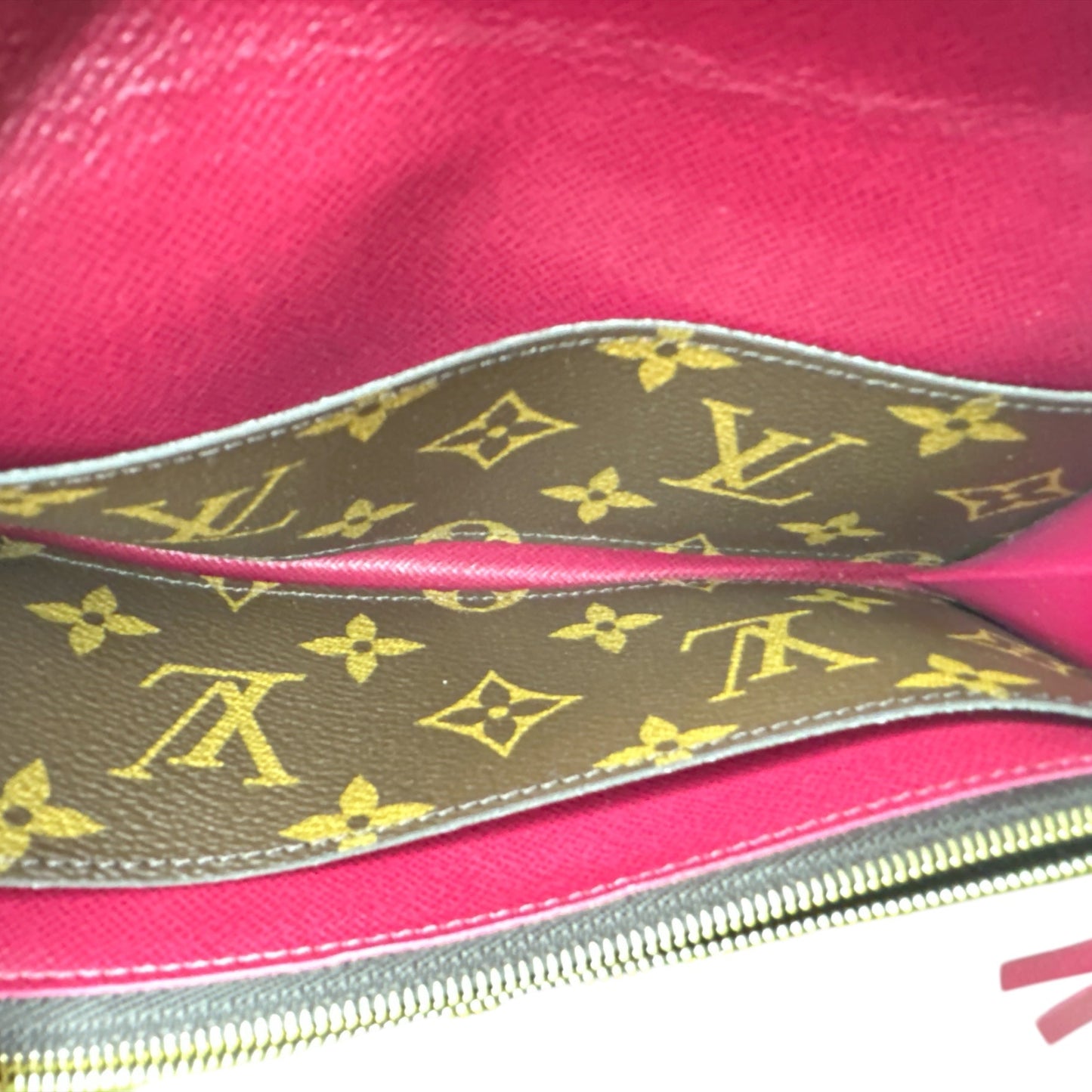 LOUIS VUITTON 
Monogram Emilie Wallet Fuchsia - Clairely Amazing