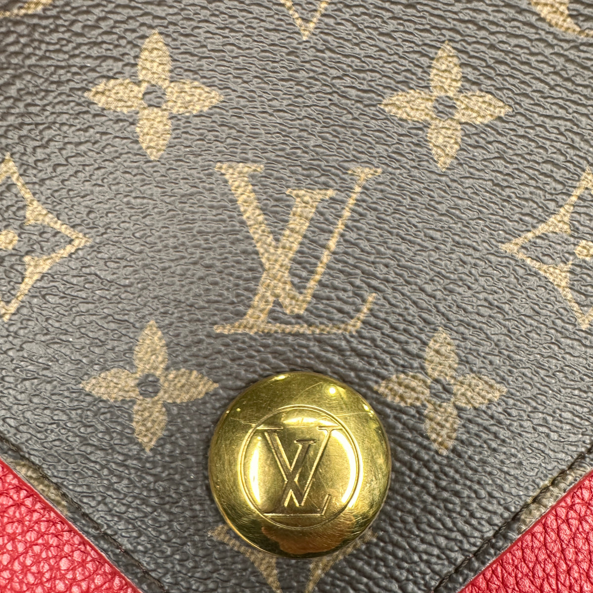 LOUIS VUITTON 
Grained Calfskin Monogram Double V Rubis - Clairely Amazing