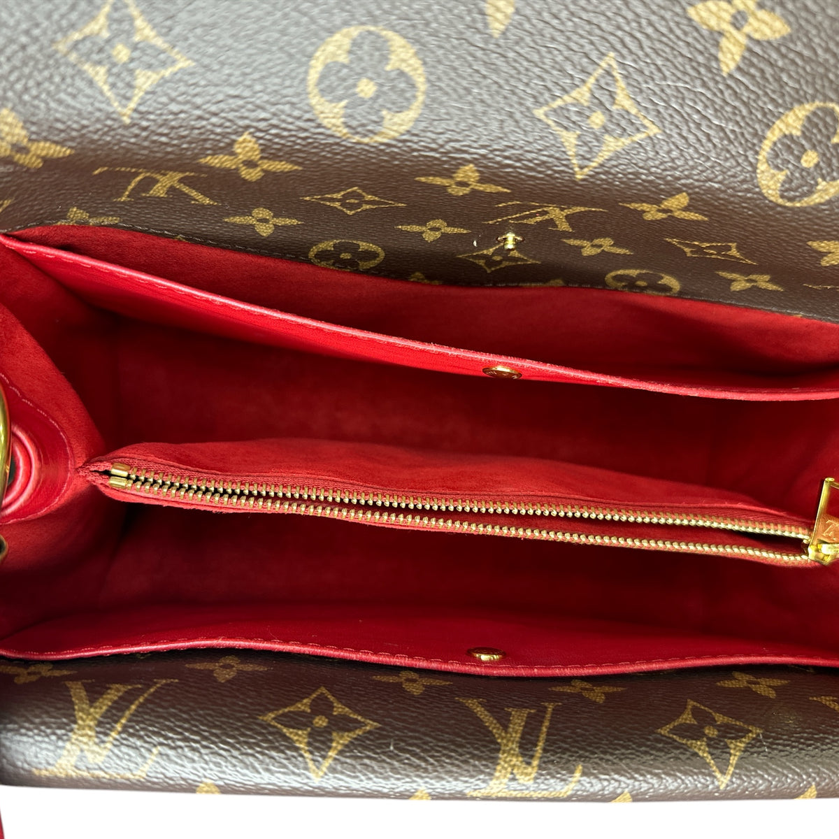 LOUIS VUITTON 
Grained Calfskin Monogram Double V Rubis - Clairely Amazing