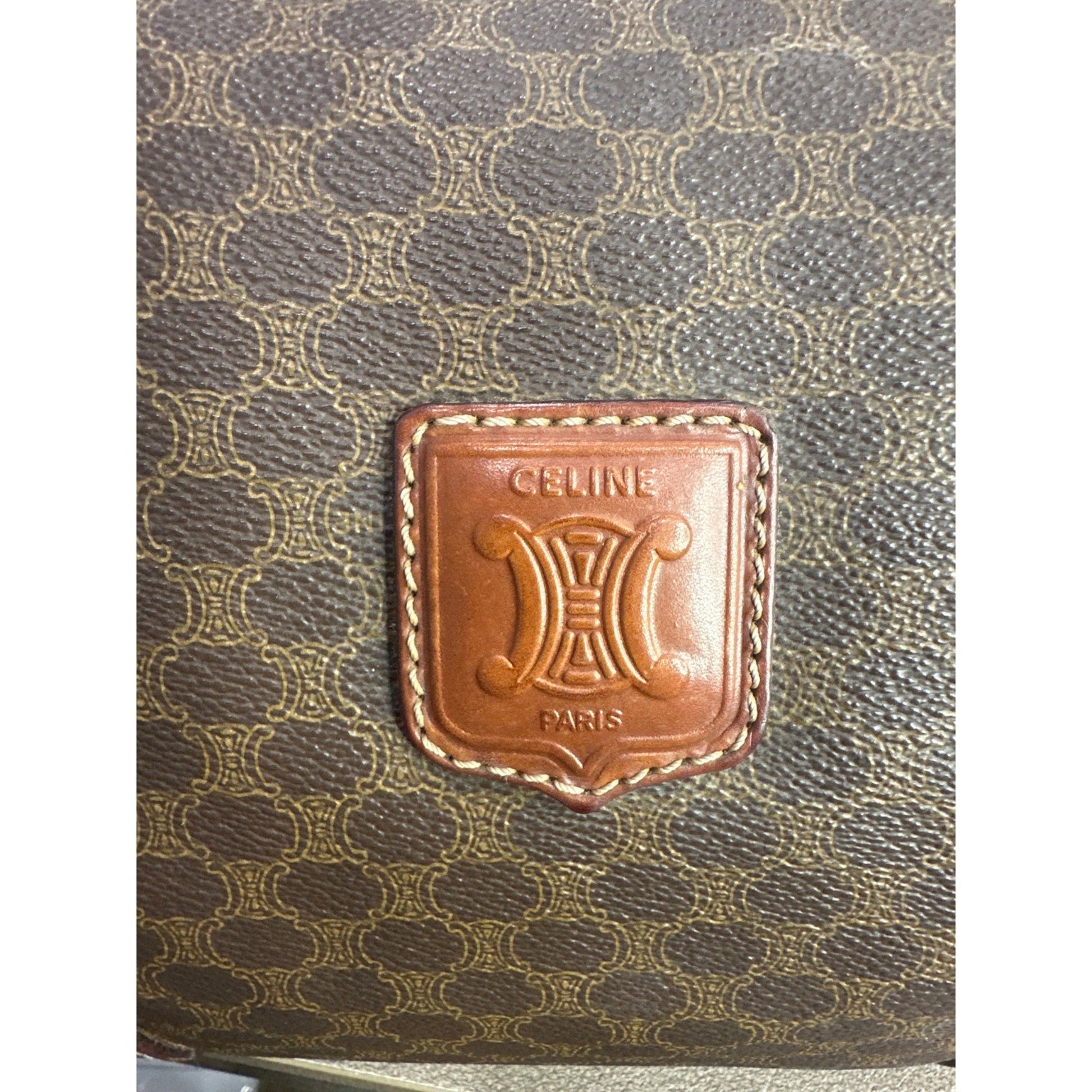 Celine bag with brown logo on a patterned background
