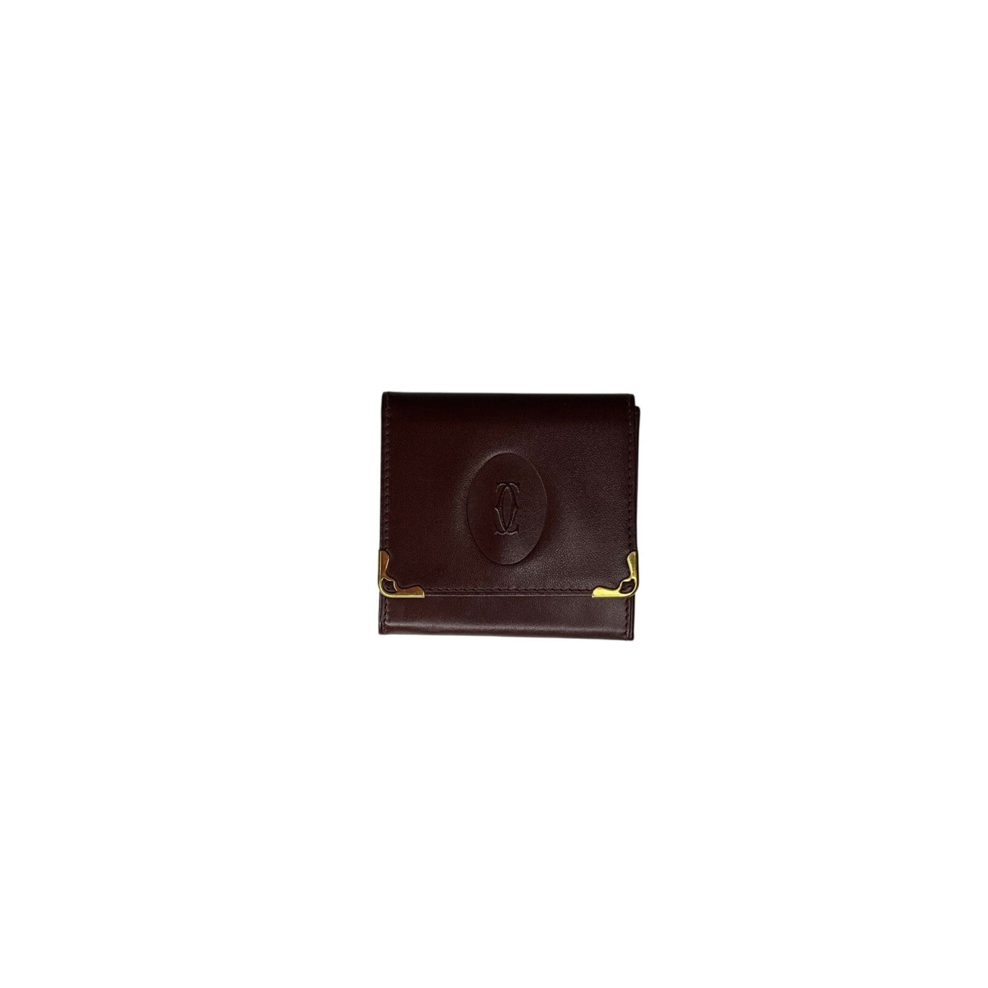 Brown leather wallet with gold accents on a white background