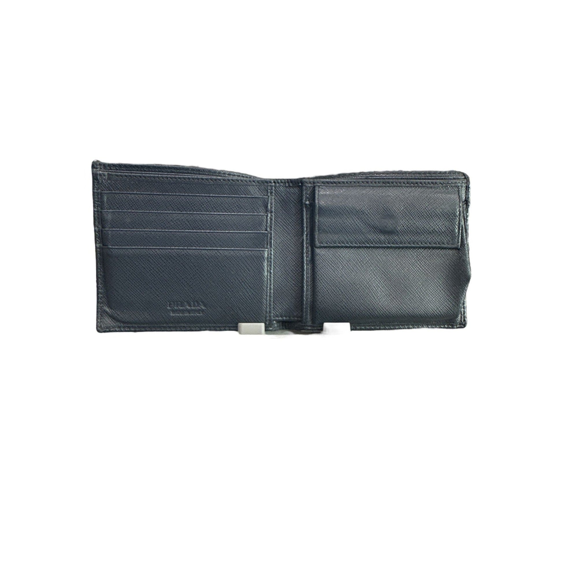 Black leather wallet open on a white background