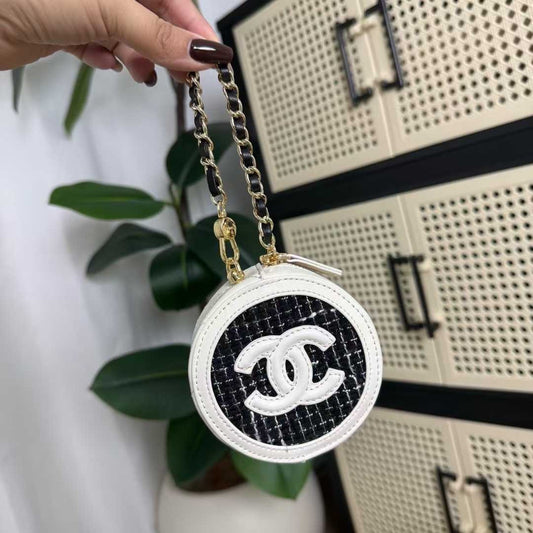 Chanel Makeup Tweed Quilted Round Filigree Pouch With Chain in white and black