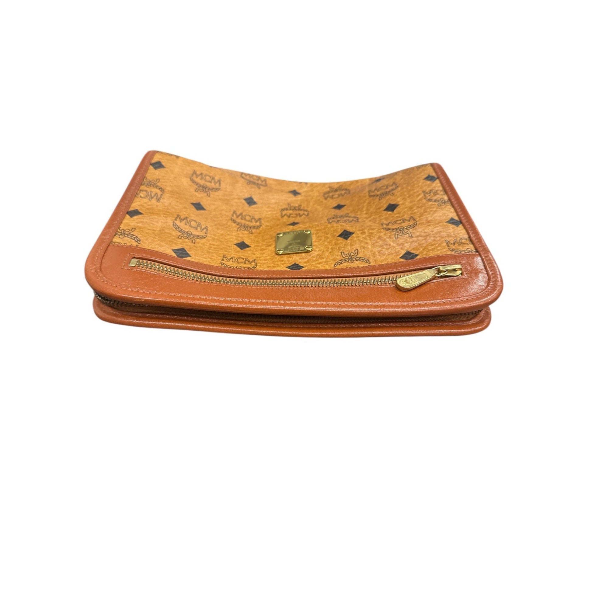 Brown leather wallet with gold zipper and MCM logo on a white background