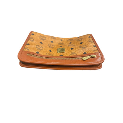 Brown leather wallet with gold zipper and MCM logo on a white background