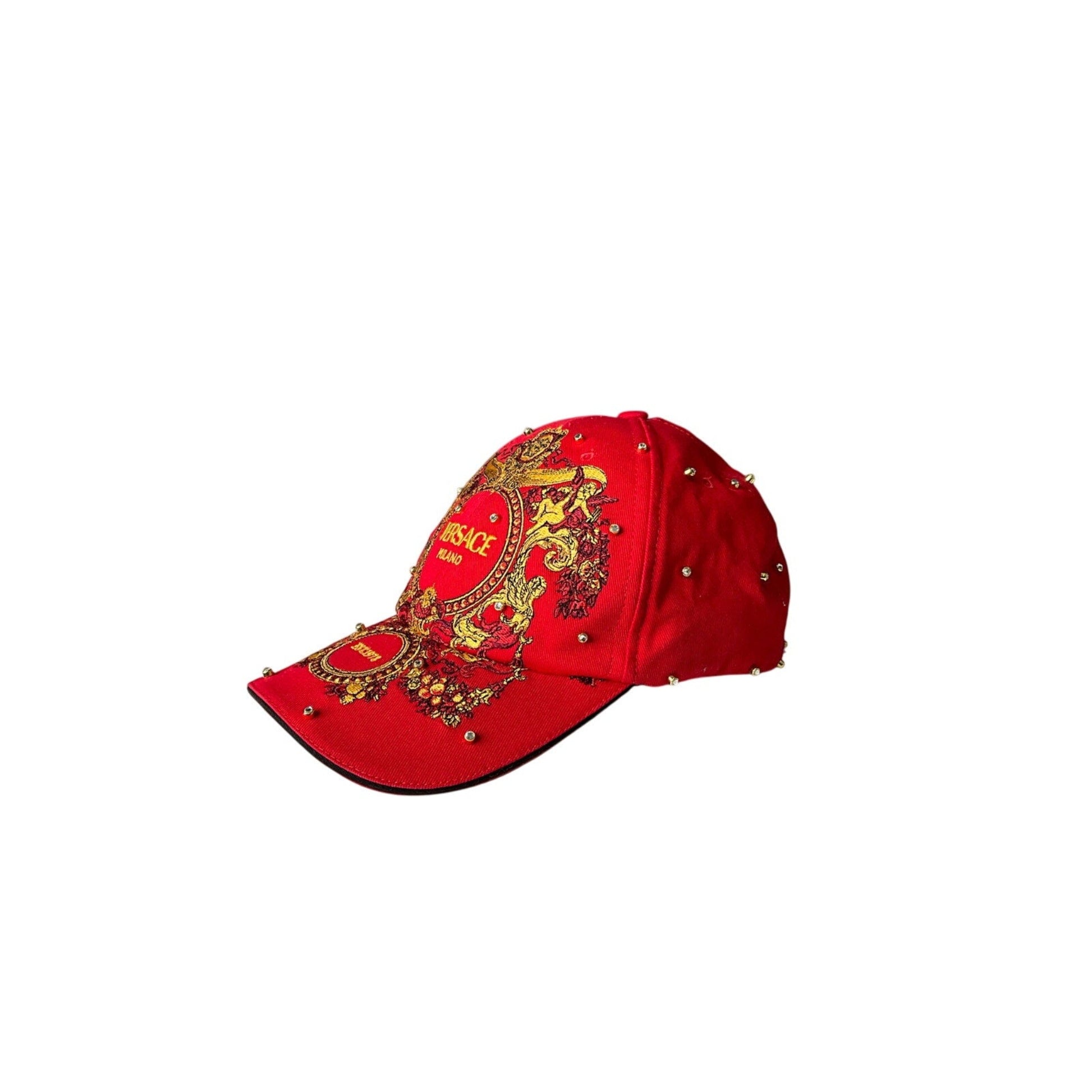 Red cap with gold embroidery on a white background