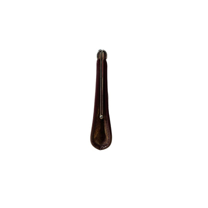 Wooden shoe horn on a white background