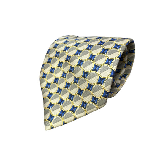 Patterned tie with blue and yellow circles on a white background