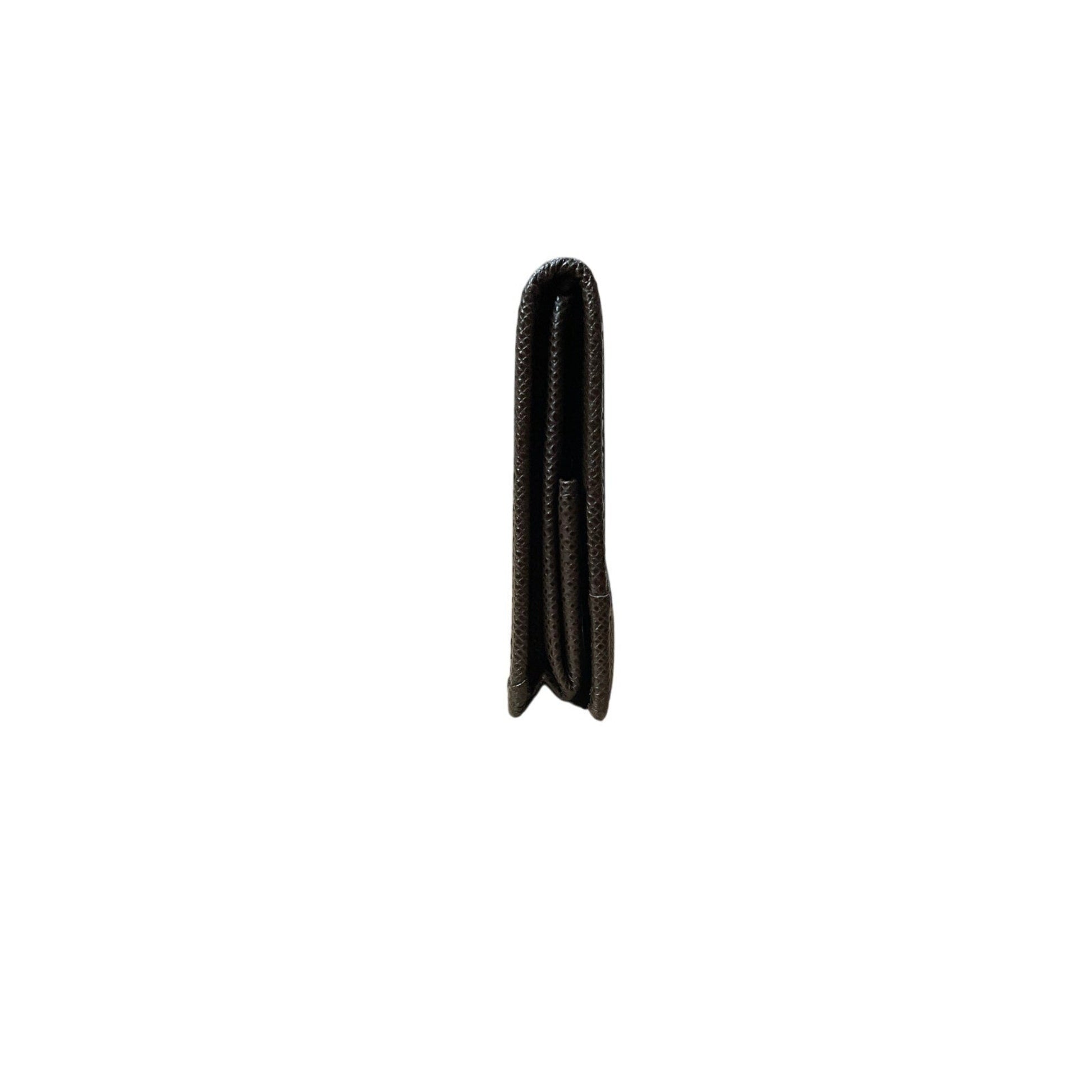 Black rubber grommet on a white background