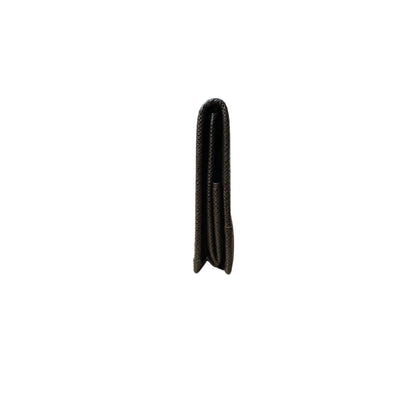 Black rubber grommet on a white background