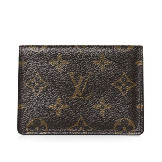Louis Vuitton wallet with monogram pattern on a white background