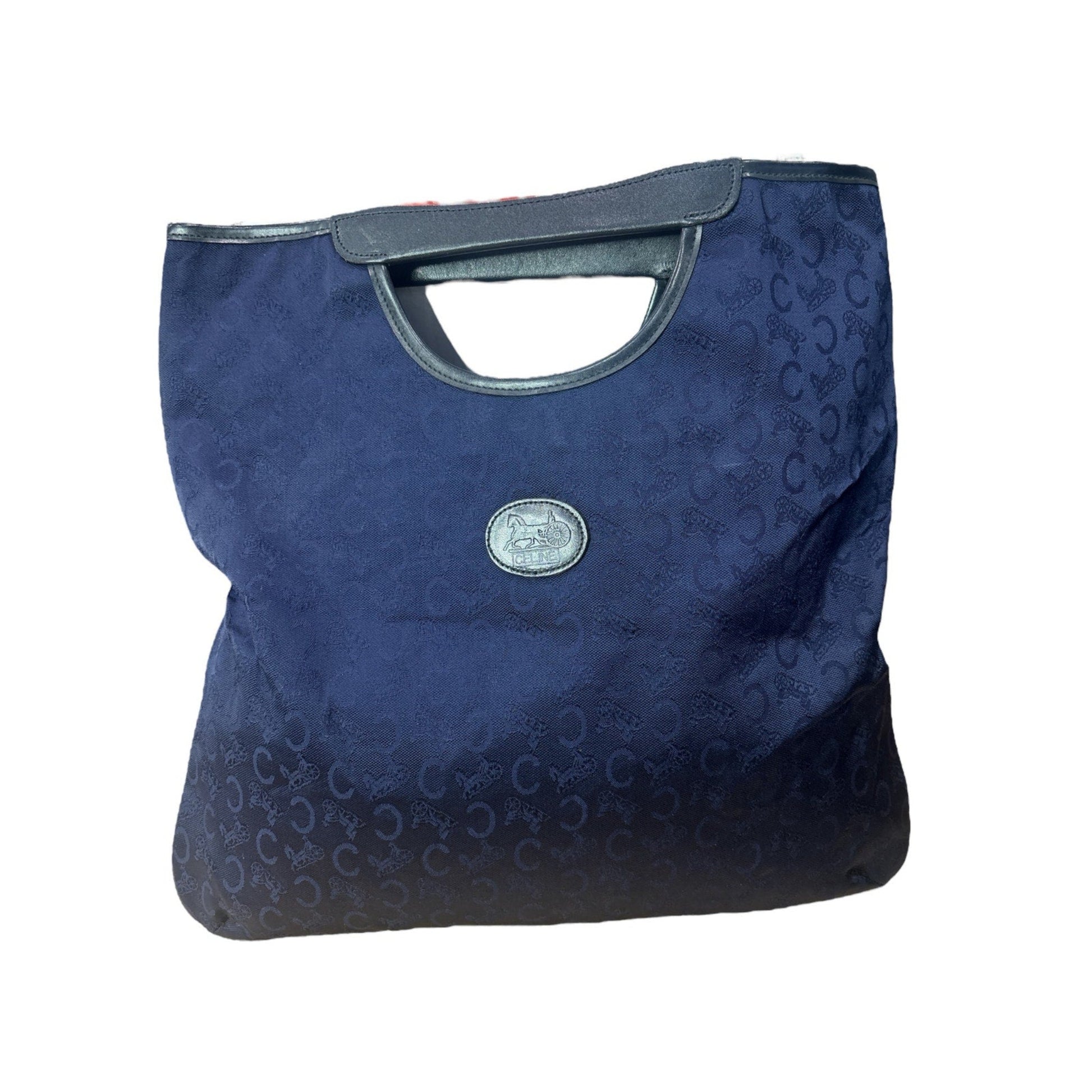 Blue handbag with a pattern on a white background