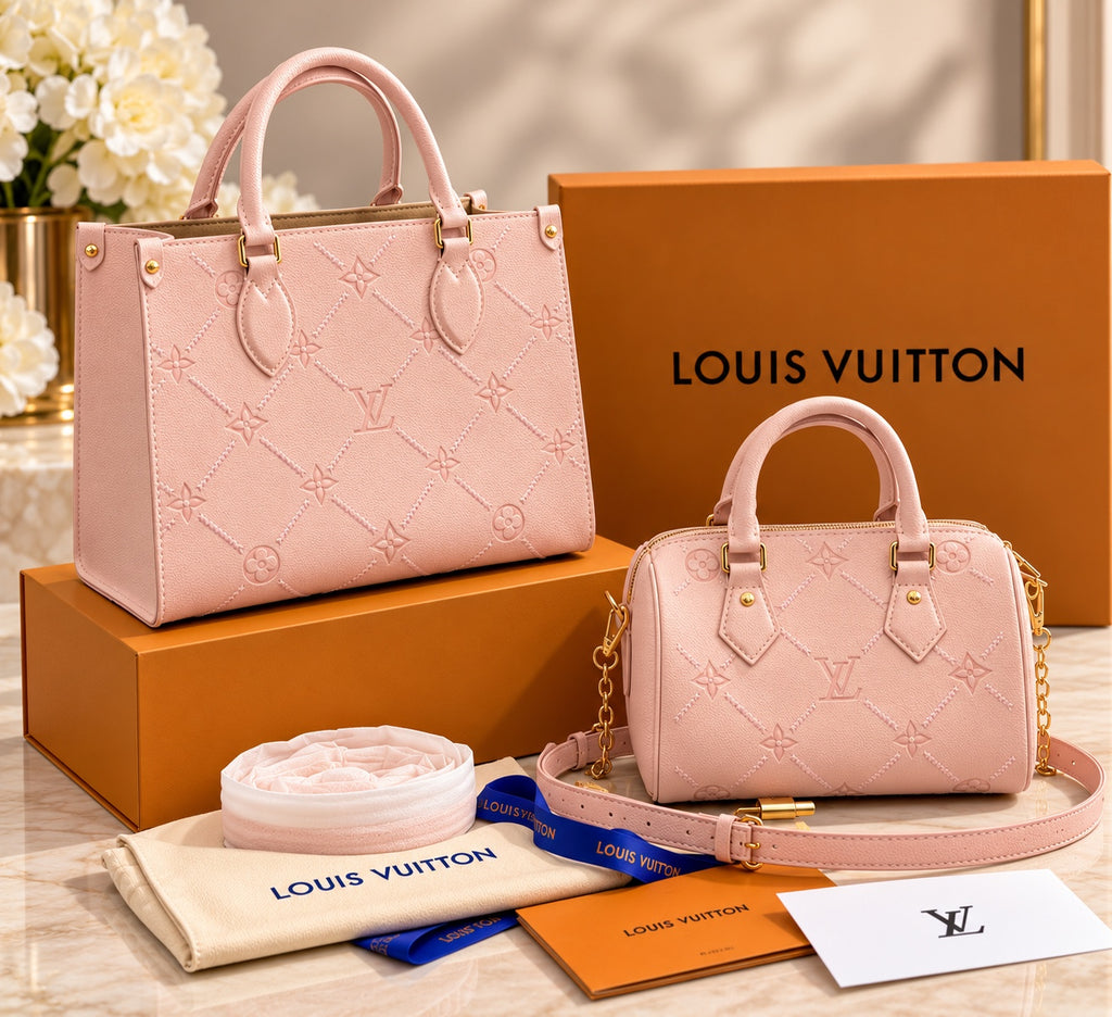Large pink structured tote and small pink barrel bag